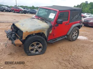2014 Jeep Wrangler Sport с VIN 1C4AJWAGXEL107854, выставлен на аукционе IAAI как лот 42648024 с пробегом Не указан миль и . История ставок и продаж доступна на DreamBid. Изображение 2.