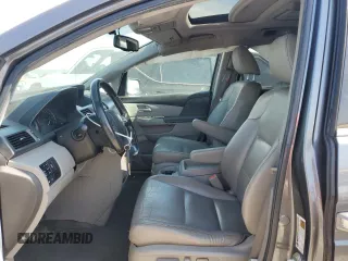 2012 Honda Odyssey Touring с VIN 5FNRL5H95CB120347, выставлен на аукционе Copart как лот 59111775 с пробегом 208 419 миль миль и Списание • Salvage title. История ставок и продаж доступна на DreamBid. Изображение 7.