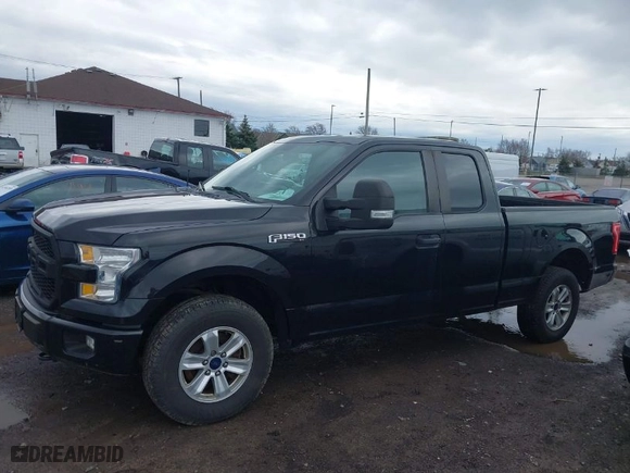 2015 Ford F-150 XLT with VIN 1FTEX1E86FFD05112, listed as a IAAI auction lot 41958169 with 129,426 mi miles. Bid and sale history available at carsss.com. Image 14.