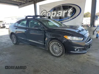 2014 Ford Fusion Titanium Hybrid with VIN 3FA6P0RUXER363916, listed as a Copart auction lot 62224315 with 126,308 mi miles and Salvage title. Bid and sale history available at DreamBid. Image 4.