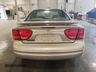 2002 Oldsmobile Alero GL1 z VIN 1G3NL52F52C133589, wystawiony jako Copart lot #77093824 z przebiegiem 150 353 mil mil oraz Szkoda całkowita • Salvage title. Historia ofert i sprzedaży dostępna na DreamBid. Obrazek 6.