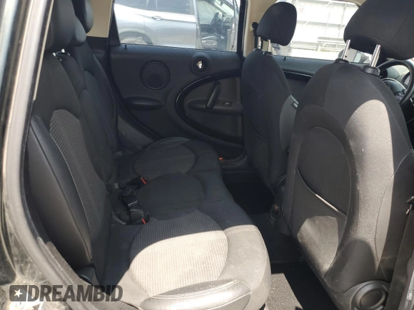 2013 MINI Countryman S with VIN WMWZC3C58DWP21965, listed as a Copart auction lot 61161735 with 142,797 mi miles and Salvage title. Bid and sale history available at DreamBid. Image 11.