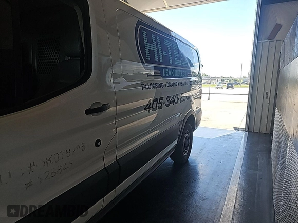 2016 Ford Transit Cargo with VIN 1FTYE1ZM0GKB06690, listed as a IAAI auction lot 42677893 with 295,974 mi miles and . Bid and sale history available at DreamBid. Image 21.