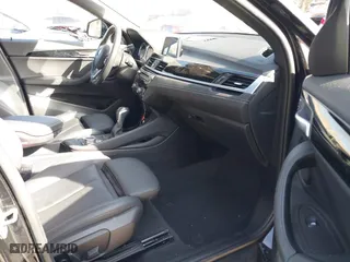 2019 BMW X2 xDrive28i with VIN WBXYJ5C52K5N24828, listed as a IAAI auction lot 41155049 with 59,597 mi miles. Bid and sale history available at carsss.com. Image 5.