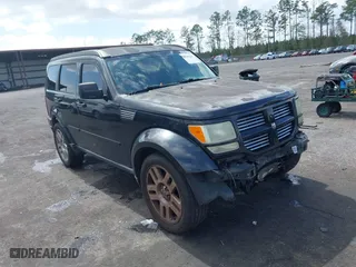 2011 Dodge Nitro Heat with VIN 1D4PT4GK3BW527067, listed as a IAAI auction lot 41761156 with 183,526 mi miles. Bid and sale history available at carsss.com. Image 1.