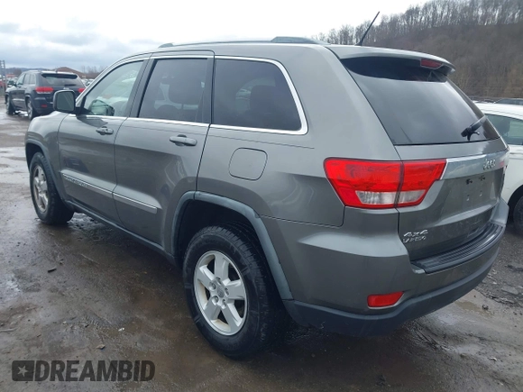 2012 Jeep Grand Cherokee Laredo with VIN 1C4RJFAGXCC118823, listed as a IAAI auction lot 41808398 with 153,509 mi miles. Bid and sale history available at carsss.com. Image 3.