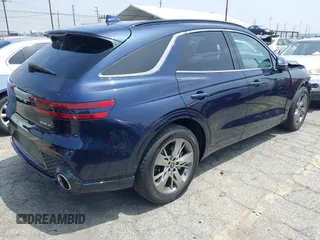 2022 Genesis GV70 Sport z VIN KMUMCDTC8NU073409, wystawiony jako IAAI lot #42165056 z przebiegiem 78 392 mil mil oraz . Historia ofert i sprzedaży dostępna na DreamBid. Obrazek 4.
