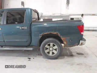 2005 Nissan Titan LE with VIN 1N6AA07B55N500154, listed as a IAAI auction lot 42455068 with 147,180 mi miles and . Bid and sale history available at DreamBid. Image 6.