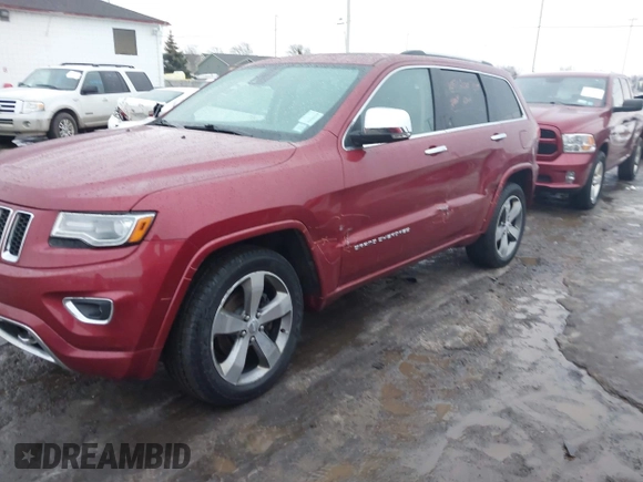 2014 Jeep Grand Cherokee Overland with VIN 1C4RJFCG9EC299235, listed as a IAAI auction lot 41670065 with 108,589 mi miles and . Bid and sale history available at DreamBid. Image 6.