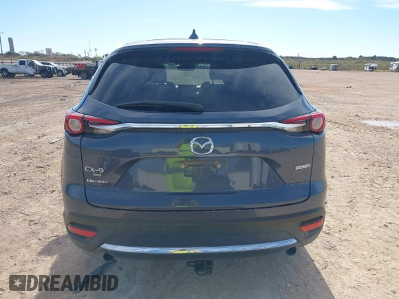 2022 Mazda CX-9 Grand Touring with VIN JM3TCBDY6N0613996, listed as a IAAI auction lot 41018105 with 58,110 mi miles. Bid and sale history available at carsss.com. Image 16.
