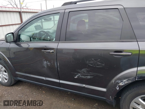 2017 Dodge Journey SE with VIN 3C4PDCAB9HT603595, listed as a IAAI auction lot 41914690 with 104,960 mi miles and . Bid and sale history available at DreamBid. Image 14.