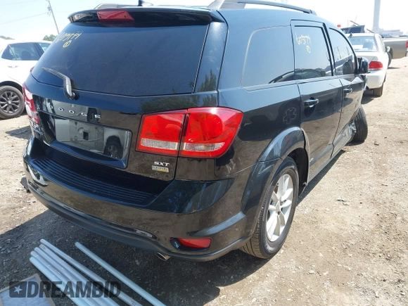 2015 Dodge Journey SXT with VIN 3C4PDCBG7FT605174, listed as a IAAI auction lot 42465723 with 172,130 mi miles and . Bid and sale history available at DreamBid. Image 4.