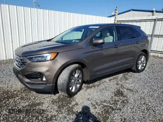 2019 Ford Edge Titanium with VIN 2FMPK4K99KBC31259, listed as a Copart auction lot 63067555 with 86,629 mi miles and Salvage title. Bid and sale history available at DreamBid. Image 1.