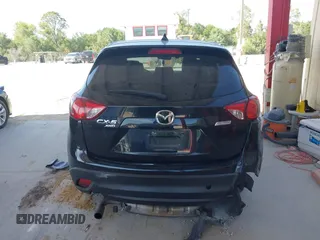 2015 Mazda CX-5 Grand Touring with VIN JM3KE4DY7F0481883, listed as a IAAI auction lot 42091709 with 184,248 mi miles and . Bid and sale history available at DreamBid. Image 17.
