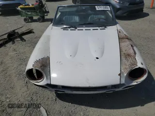 1973 FIAT 124 Spider z VIN 124CS0065983, wystawiony jako Copart lot #57913365 z przebiegiem Nie podano mil oraz Tytuł czysty. Historia ofert i sprzedaży dostępna na DreamBid. Obrazek 5.