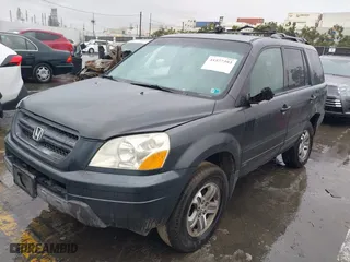 2005 Honda Pilot EX-L with NAVI with VIN 2HKYF18745H567671, listed as a IAAI auction lot 41577393 with 178,182 mi miles. Bid and sale history available at carsss.com. Image 2.