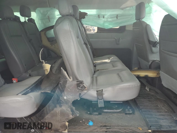 2018 Ford Transit Passenger XL z VIN 1FBZX2ZM1JKA20840, wystawiony jako Copart lot #66152134 z przebiegiem 78 961 mil mil oraz Nie do naprawy • Non repairable. Historia ofert i sprzedaży dostępna na DreamBid. Obrazek 11.