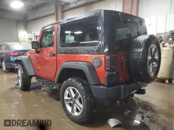 2009 Jeep Wrangler Rubicon with VIN 1J4GA64179L733136, listed as a Copart auction lot 43747805 with 94,899 mi miles and Salvage Title. Bid and sale history available at DreamBid. Image 2.