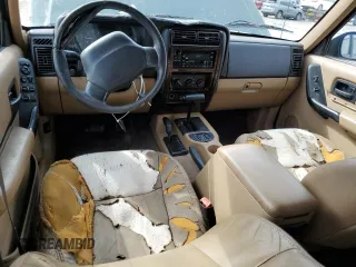 2001 Jeep Cherokee Sport with VIN 1J4FF58SX1L615967, listed as a Copart auction lot 43709235 with 241,326 mi miles and Clean title. Bid and sale history available at DreamBid. Image 8.