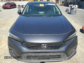 2022 Honda Civic Sedan LX with VIN 2HGFE2F2XNH548124, listed as a Copart auction lot 48738485 with 66,437 mi miles and Salvage Title. Bid and sale history available at carsss.com. Image 5.