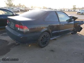 2000 Honda Civic HX with VIN 1HGEJ7225YL109267, listed as a IAAI auction lot 41097182 with 209,943 mi miles. Bid and sale history available at carsss.com. Image 4.