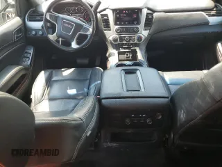 2015 GMC Yukon XL SLE with VIN 1GKS2GKC4FR678777, listed as a Copart auction lot 68642194 with 151,909 mi miles and Salvage Title. Bid and sale history available at carsss.com. Image 8.