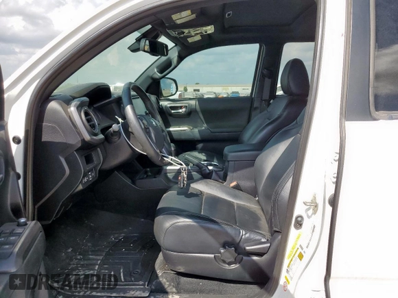 2018 Toyota Tacoma SR z VIN 3TMCZ5AN0JM178886, wystawiony jako Copart lot #56330495 z przebiegiem 71 962 mil mil oraz Szkoda całkowita • Salvage title. Historia ofert i sprzedaży dostępna na DreamBid. Obrazek 7.