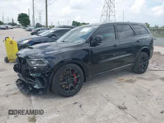 2023 Dodge Durango SRT Hellcat Premium with VIN 1C4SDJH9XPC554953, listed as a IAAI auction lot 42375728 with 19,492 mi miles and . Bid and sale history available at DreamBid. Image 22.