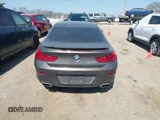 2012 BMW 6 Series 650i z VIN WBALX3C57CC528832, wystawiony jako IAAI lot #41779268 z przebiegiem 75 119 mil mil oraz . Historia ofert i sprzedaży dostępna na DreamBid. Obrazek 16.