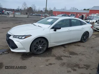 2019 Toyota Avalon XLE with VIN 4T1BZ1FB5KU014903, listed as a IAAI auction lot 41388692 with 100,599 mi miles. Bid and sale history available at carsss.com. Image 14.