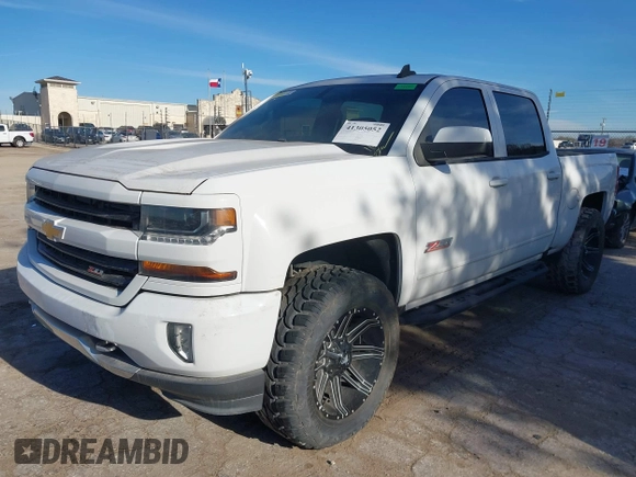 2017 Chevrolet Silverado 1500 LT with VIN 3GCUKREC4HG466329, listed as a IAAI auction lot 41305052 with 57,844 mi miles and . Bid and sale history available at DreamBid. Image 16.