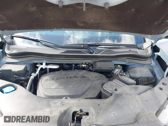 2023 Honda Passport Elite with VIN 5FNYF8H03PB000039, listed as a IAAI auction lot 40593339 with 33,697 mi miles and . Bid and sale history available at DreamBid. Image 10.
