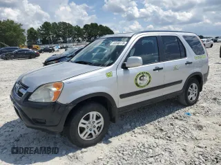 2002 Honda CR-V EX with VIN JHLRD78812C052868, listed as a Copart auction lot 63048175 with 323,315 mi miles and Salvage title. Bid and sale history available at DreamBid. Image 1.