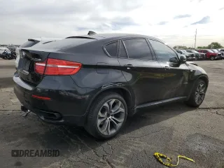 2013 BMW X6 xDrive50i z VIN 5UXFG8C57DL591149, wystawiony jako Copart lot #56979865 z przebiegiem 94 251 mil mil oraz Szkoda całkowita • Salvage title. Historia ofert i sprzedaży dostępna na DreamBid. Obrazek 3.