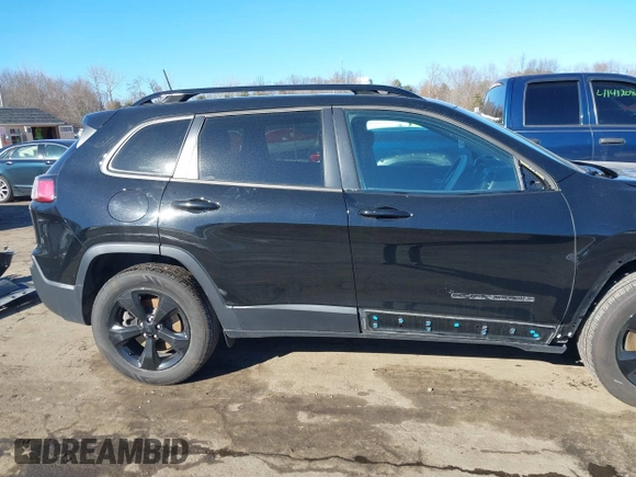 2019 Jeep Cherokee Latitude Plus with VIN 1C4PJMLX5KD369346, listed as a IAAI auction lot 41407489 with 50,898 mi miles. Bid and sale history available at carsss.com. Image 14.