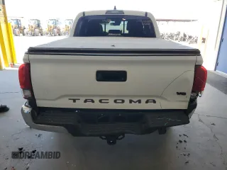 2023 Toyota Tacoma SR5 z VIN 3TMAZ5CN3PM219718, wystawiony jako Copart lot #55253845 z przebiegiem 18 879 mil mil oraz Szkody całkowita. Historia ofert i sprzedaży dostępna na DreamBid. Obrazek 6.