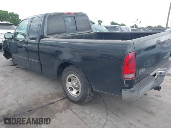 2002 Ford F-150 XL with VIN 1FTRX17202NA21470, listed as a IAAI auction lot 42098554 with 149,840 mi miles. Bid and sale history available at carsss.com. Image 3.