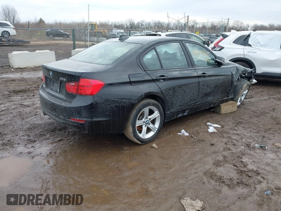 2015 BMW 3 Series 328i with VIN WBA3A5C53FP605447, listed as a IAAI auction lot 41649640 with 168,021 mi miles. Bid and sale history available at carsss.com. Image 4.