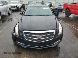 2015 Cadillac ATS Standard AWD z VIN 1G6AG1RX8F0117231, wystawiony jako Copart lot #72817124 z przebiegiem 78 640 mil mil oraz Szkoda całkowita • Salvage title. Historia ofert i sprzedaży dostępna na DreamBid. Obrazek 5.