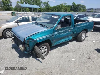 1996 Nissan Frontier XE z VIN 1N6SD11S9TC375503, wystawiony jako Copart lot #57653565 z przebiegiem 259 779 mil mil oraz Szkoda całkowita • Salvage title. Historia ofert i sprzedaży dostępna na DreamBid. Obrazek 1.