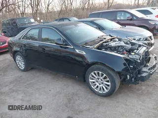 2009 Cadillac CTS RWD w/1SA with VIN 1G6DF577290133620, listed as a IAAI auction lot 41746085 with 153,274 mi miles. Bid and sale history available at carsss.com. Image 1.