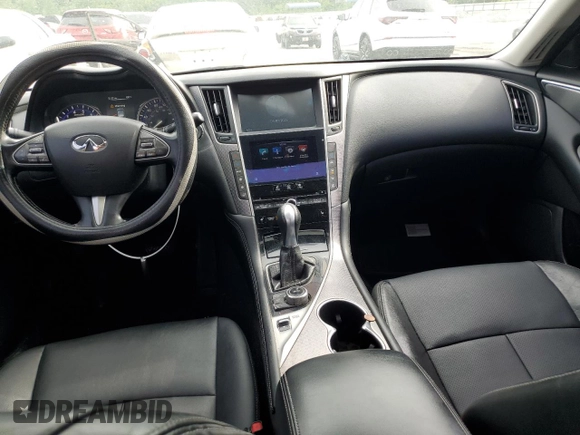 2014 Infiniti Q50 Premium с VIN JN1BV7ARXEM697759, выставлен на аукционе Copart как лот 55996815 с пробегом 129 642 миль миль и Списание • Salvage title. История ставок и продаж доступна на DreamBid. Изображение 8.