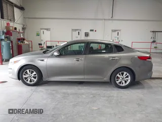 2016 Kia Optima LX with VIN 5XXGT4L33GG026183, listed as a IAAI auction lot 42156799 with 163,000 mi miles and . Bid and sale history available at carsss.com. Image 14.