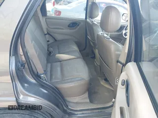 2003 Ford Escape Limited with VIN 1FMCU94173KB02067, listed as a IAAI auction lot 42088659 with 236,209 mi miles. Bid and sale history available at carsss.com. Image 8.