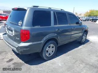 2004 Honda Pilot EX with VIN 2HKYF18514H623272, listed as a IAAI auction lot 42020669 with 186,766 mi miles. Bid and sale history available at carsss.com. Image 4.