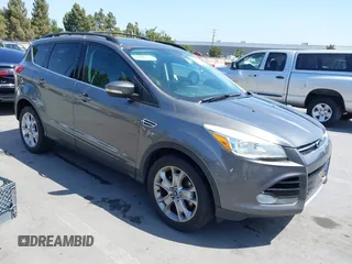 2013 Ford Escape SEL z VIN 1FMCU9HX9DUB15665, wystawiony jako IAAI lot #42518587 z przebiegiem 96 317 mil mil oraz . Historia ofert i sprzedaży dostępna na DreamBid. Obrazek 1.