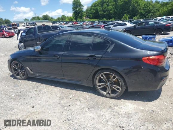 2019 BMW 5 Series M550i xDrive with VIN WBAJB9C53KB289356, listed as a Copart auction lot 57814535 with 60,454 mi miles and Clean title. Bid and sale history available at DreamBid. Image 2.