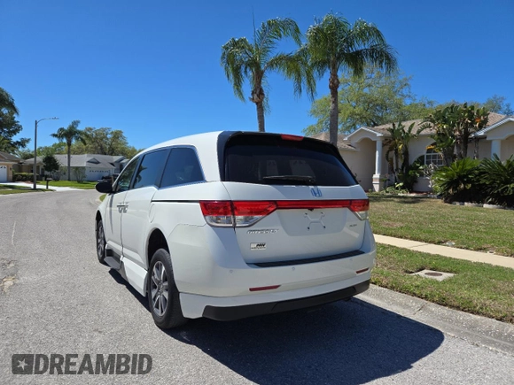 2017 Honda Odyssey Touring z VIN 5FNRL5H91HB008068, wystawiony jako Copart lot #49853805 z przebiegiem 33 521 mil mil oraz Czysty tytuł • Clean title. Historia ofert i sprzedaży dostępna na DreamBid. Obrazek 3.