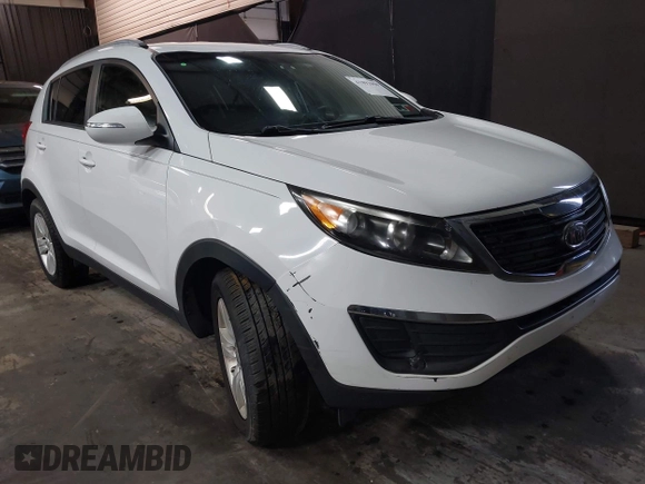 2012 Kia Sportage LX with VIN KNDPB3A26C7269092, listed as a IAAI auction lot 41892059 with 149,000 mi miles. Bid and sale history available at carsss.com. Image 6.