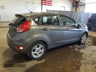 2014 Ford Fiesta SE with VIN 3FADP4EJ7EM232353, listed as a Copart auction lot 54680865 with 52,673 mi miles and Salvage Title. Bid and sale history available at DreamBid. Image 3.